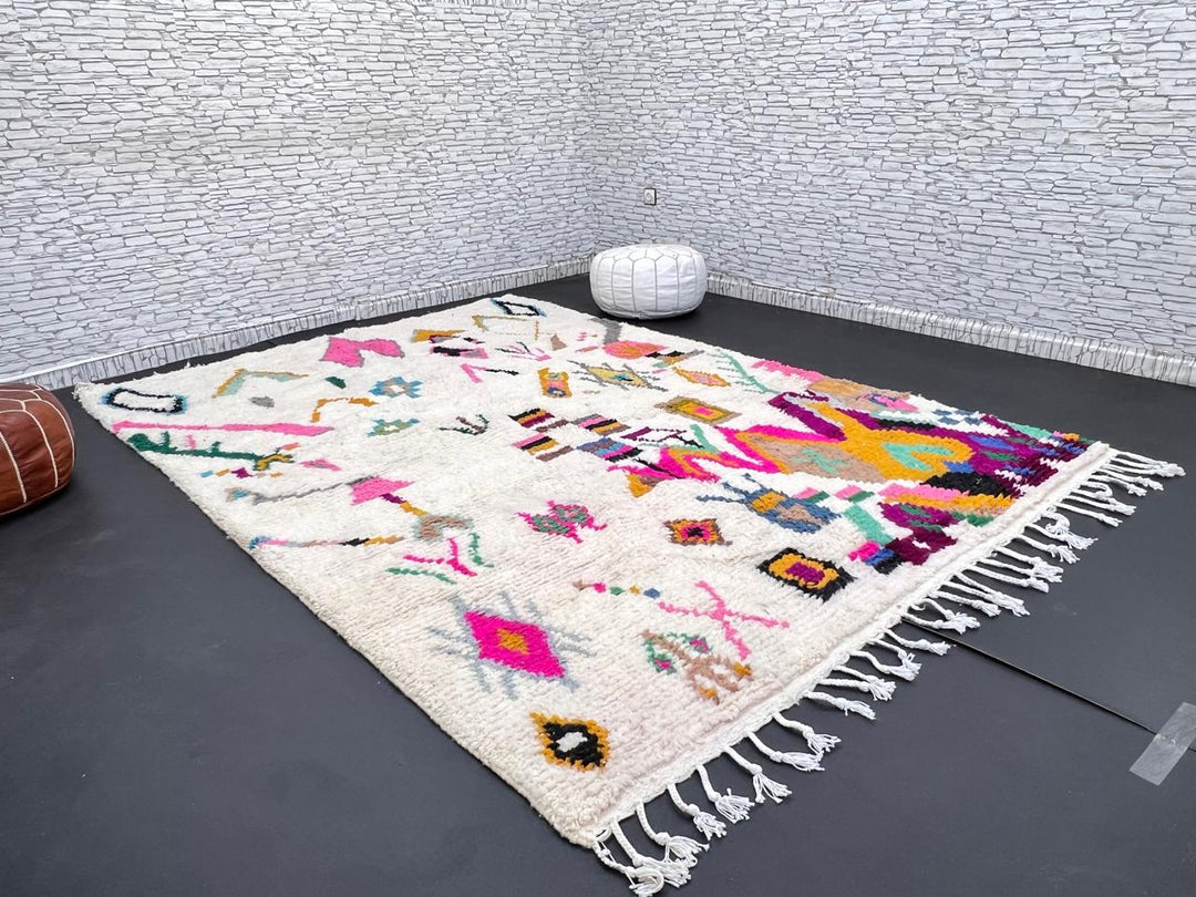 Natural white Moroccan Berber wool rug with colorful symbolic patterns