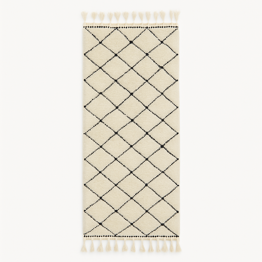 Handmade Moroccan runner rug with classic black diamond lattice design on a white wool background, crafted by Berber artisans.