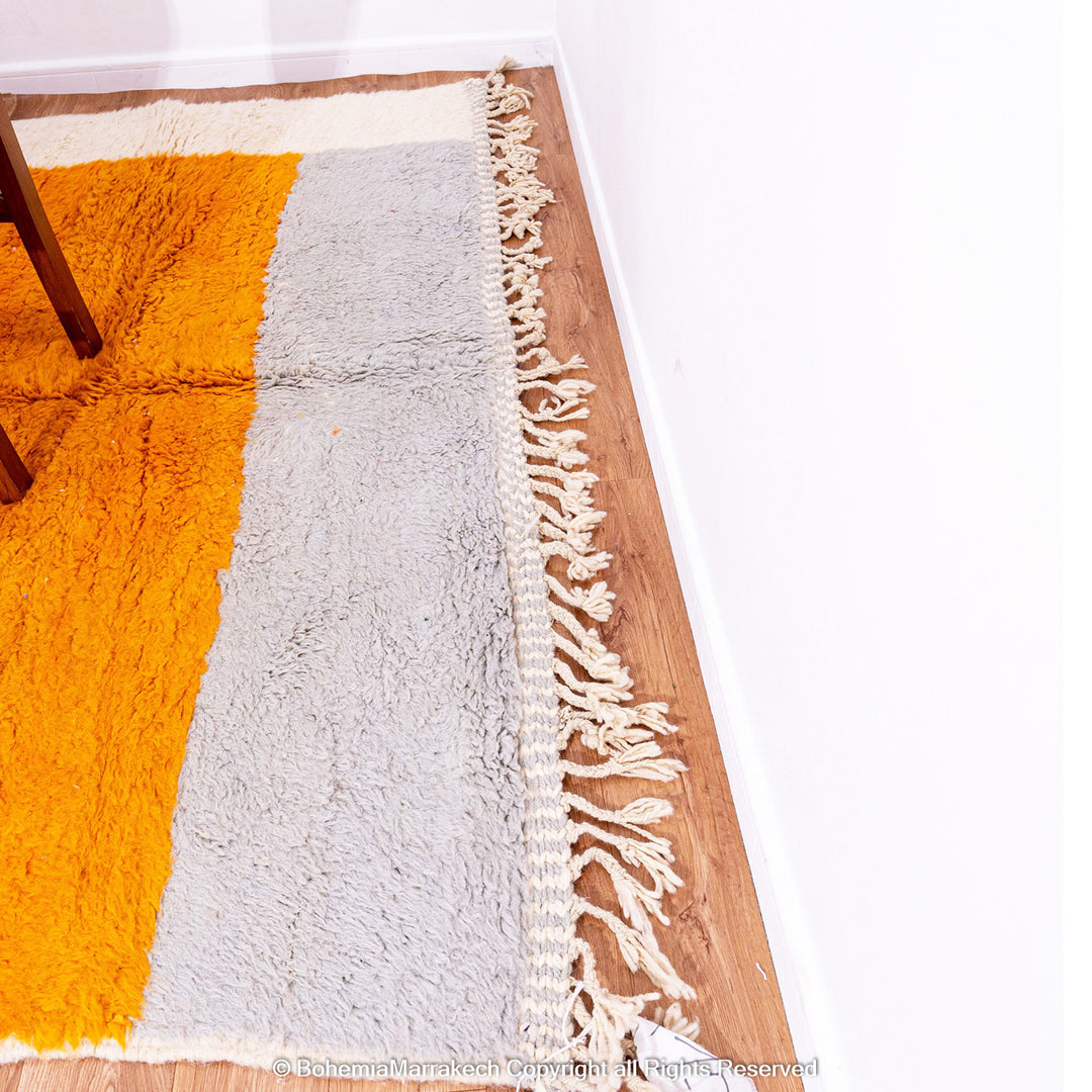 Handmade Beni Ourain Moroccan rug in sunset colors with saffron, red, ivory, and black block pattern