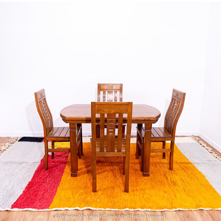 Handmade Beni Ourain Moroccan rug in sunset colors with saffron, red, ivory, and black block pattern