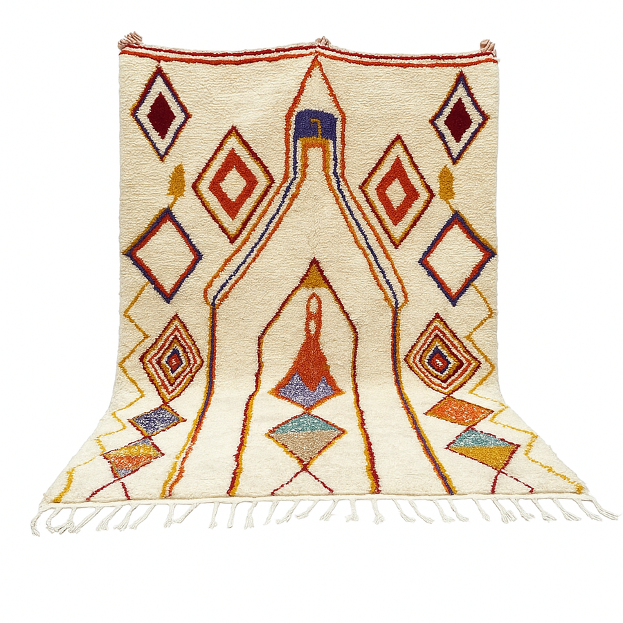Handwoven Moroccan wool rug with cream background and colorful geometric Berber motifs in orange, yellow, blue, and terracotta