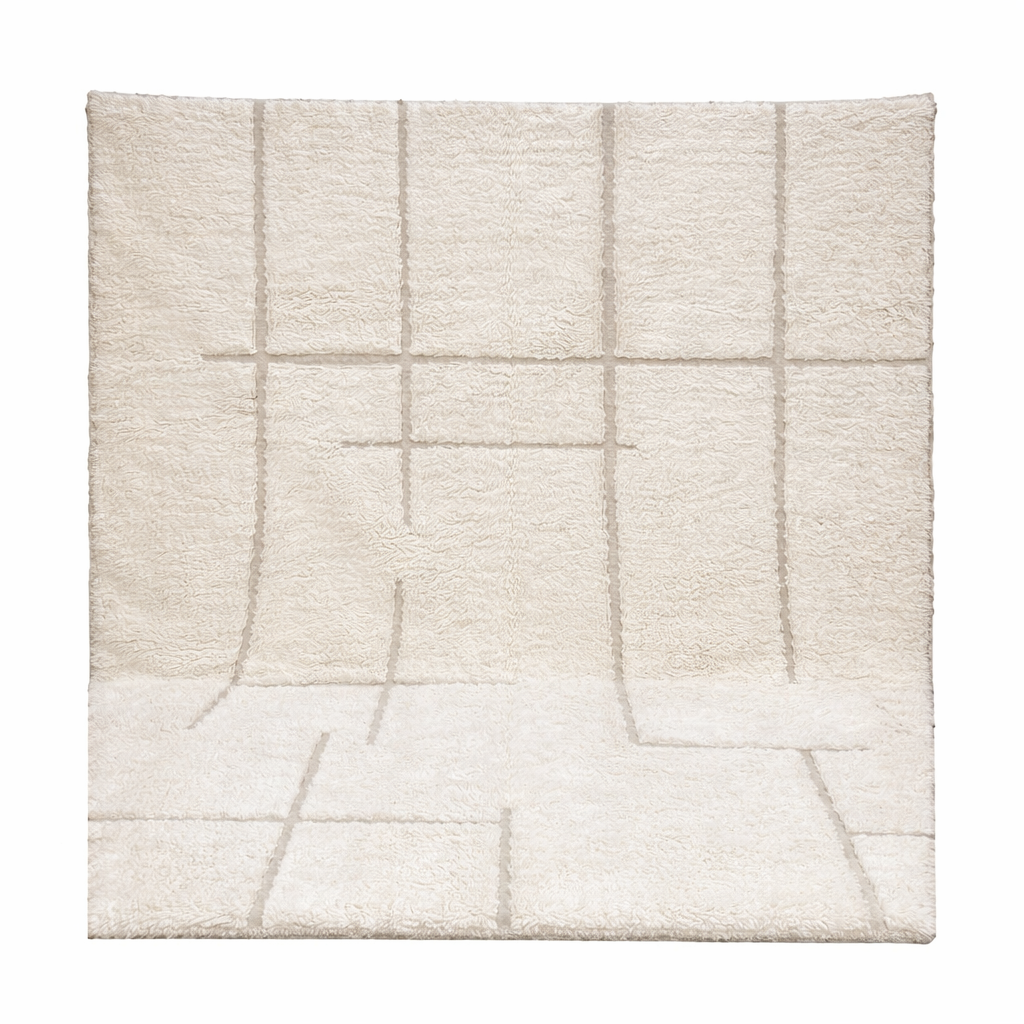 Ivory Moroccan wool rug with subtle raised grid pattern