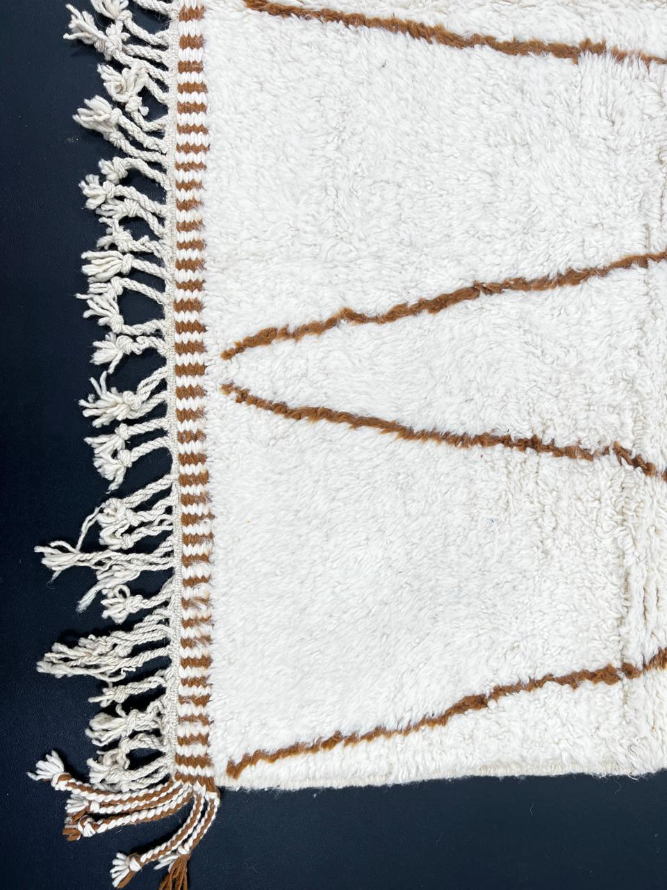 Handmade Moroccan wool runner rug with white background and brown Berber diamond pattern, plush texture, fringed edges – modern boho Moroccan carpet for hallway and corridor decor
