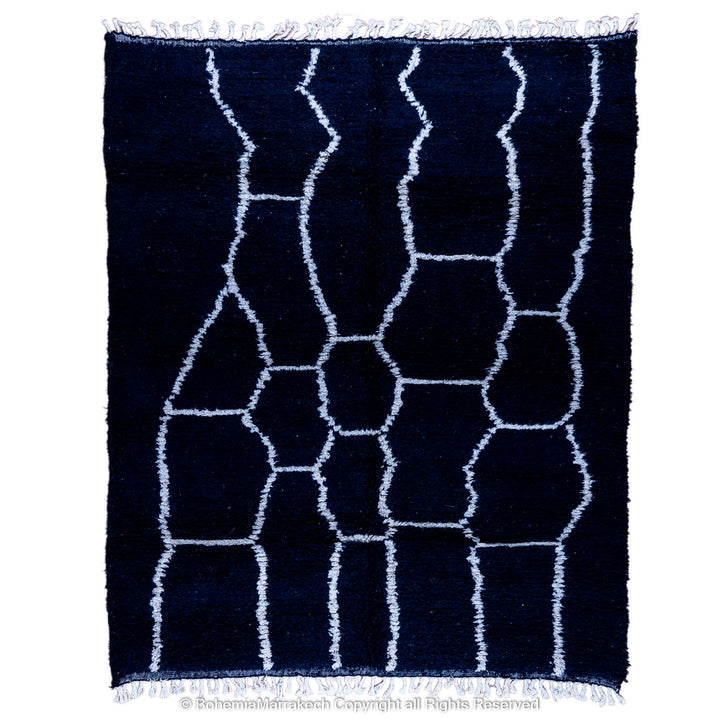 Solid black Moroccan rug with hand-knotted white tribal lines