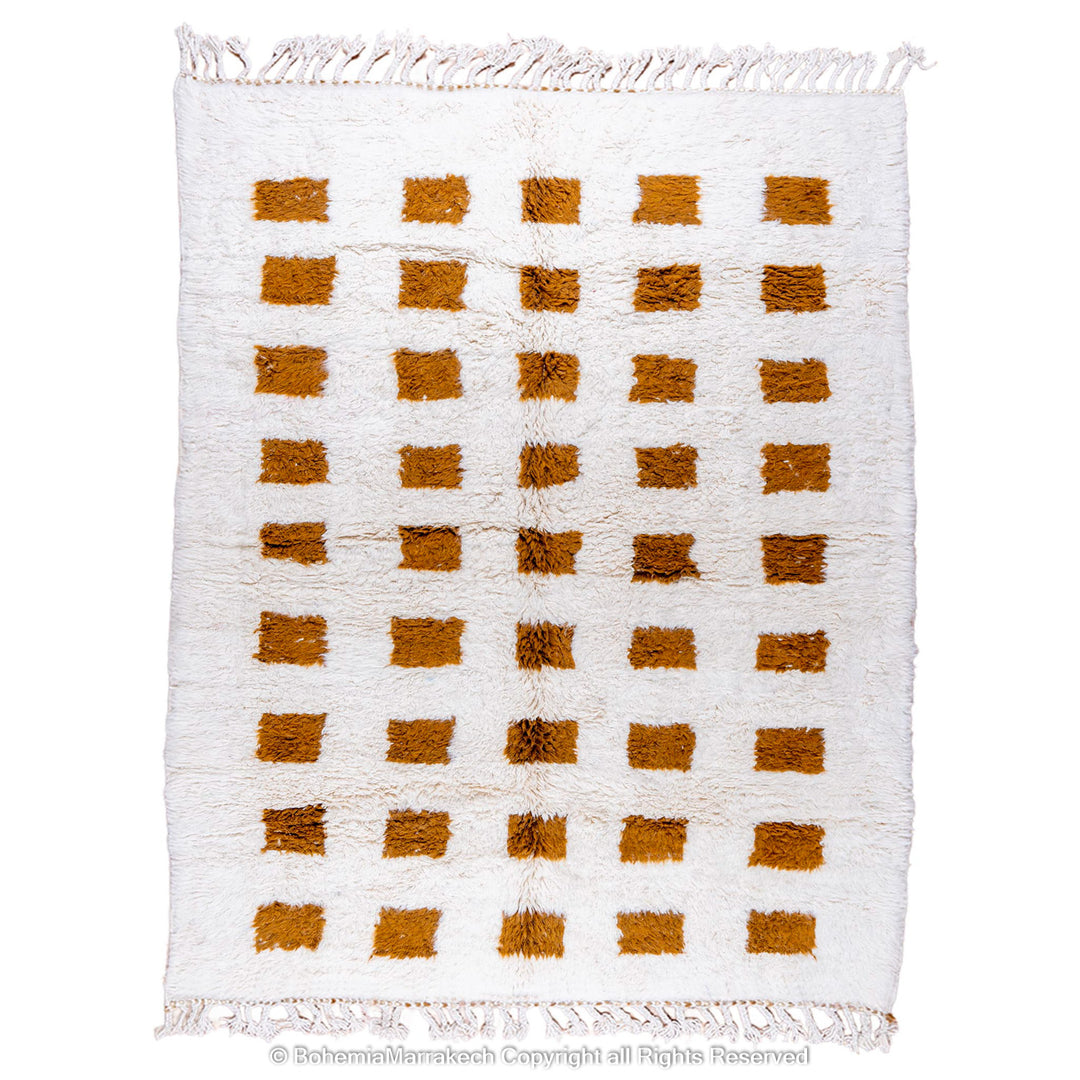 Handmade Moroccan rug with brown checkered pattern on white wool background