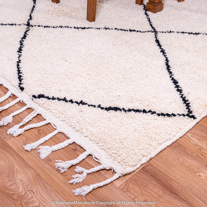 Hand-knotted Beni Ourain Moroccan rug with black diamond lines on ivory wool – handmade Berber carpet