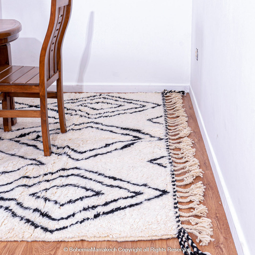 Handwoven Beni Ourain Moroccan runner rug with black diamond pattern on natural wool
