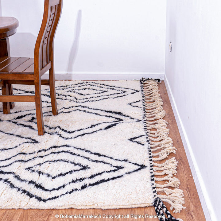Handwoven Beni Ourain Moroccan runner rug with black diamond pattern on natural wool