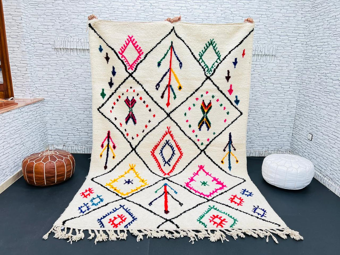 Multicolor Moroccan wool rug with ivory base and colorful Berber diamond patterns
