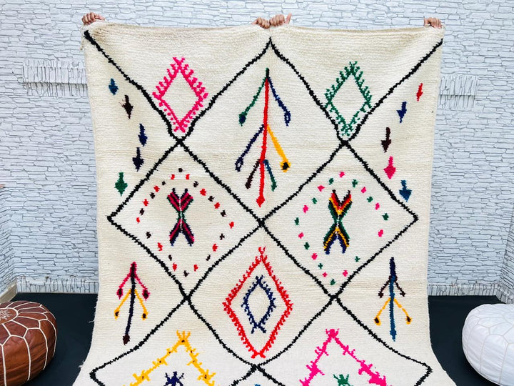Multicolor Moroccan wool rug with ivory base and colorful Berber diamond patterns
