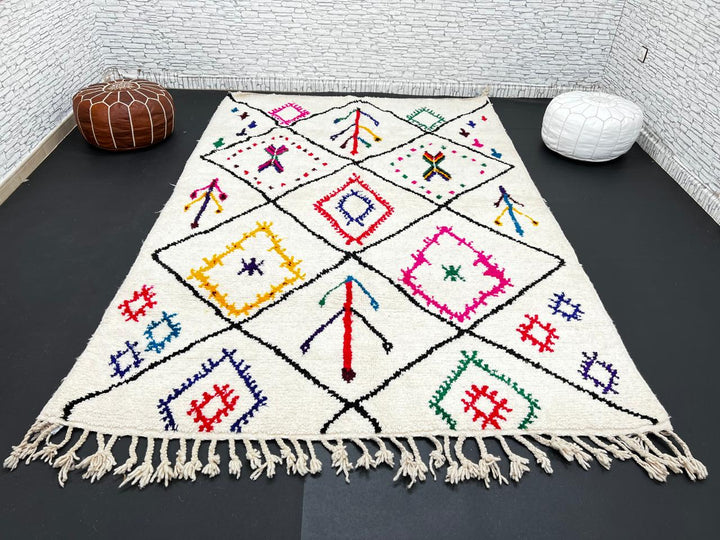 Multicolor Moroccan wool rug with ivory base and colorful Berber diamond patterns