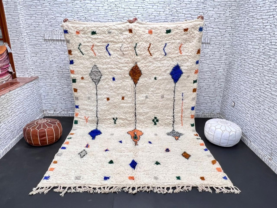 Natural white Moroccan Berber wool rug with symbolic diamond motifs