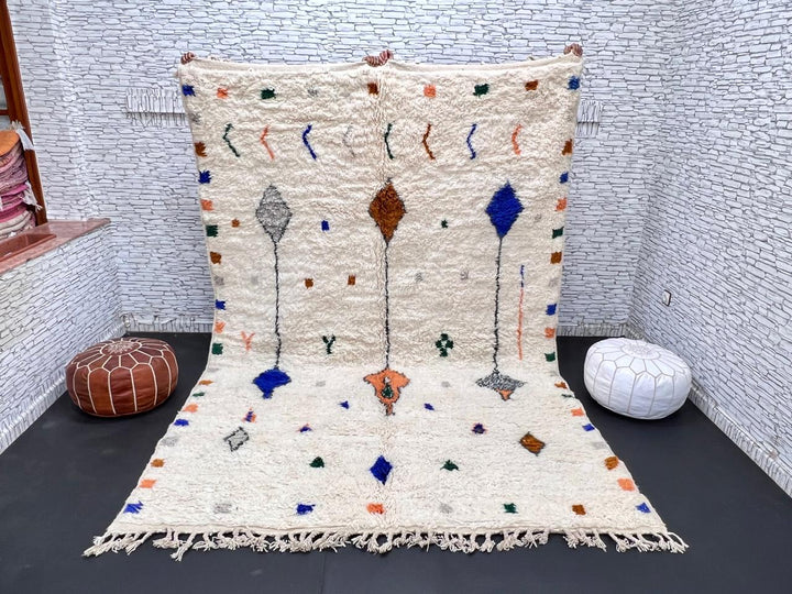 Natural white Moroccan Berber wool rug with symbolic diamond motifs