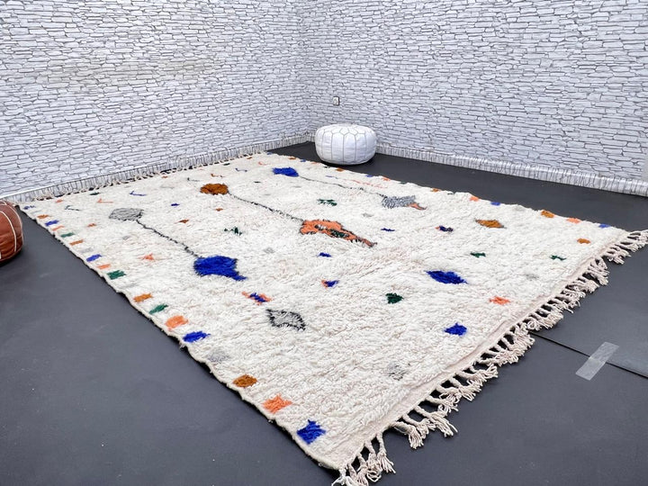 Natural white Moroccan Berber wool rug with symbolic diamond motifs