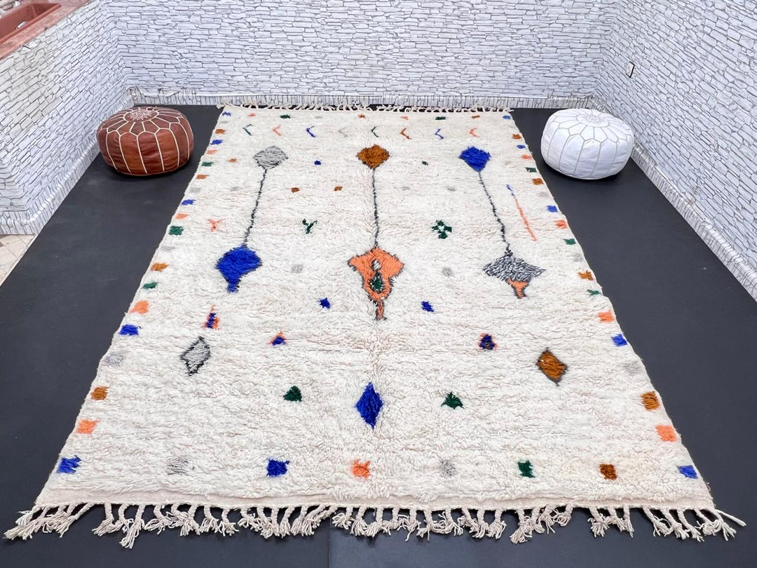 Natural white Moroccan Berber wool rug with symbolic diamond motifs