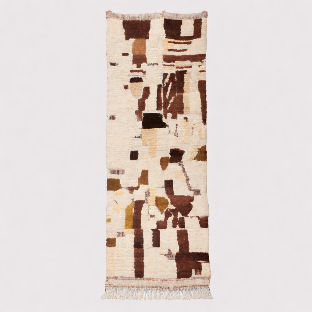 Handwoven Moroccan wool runner rug with abstract white and brown earth-tone pattern