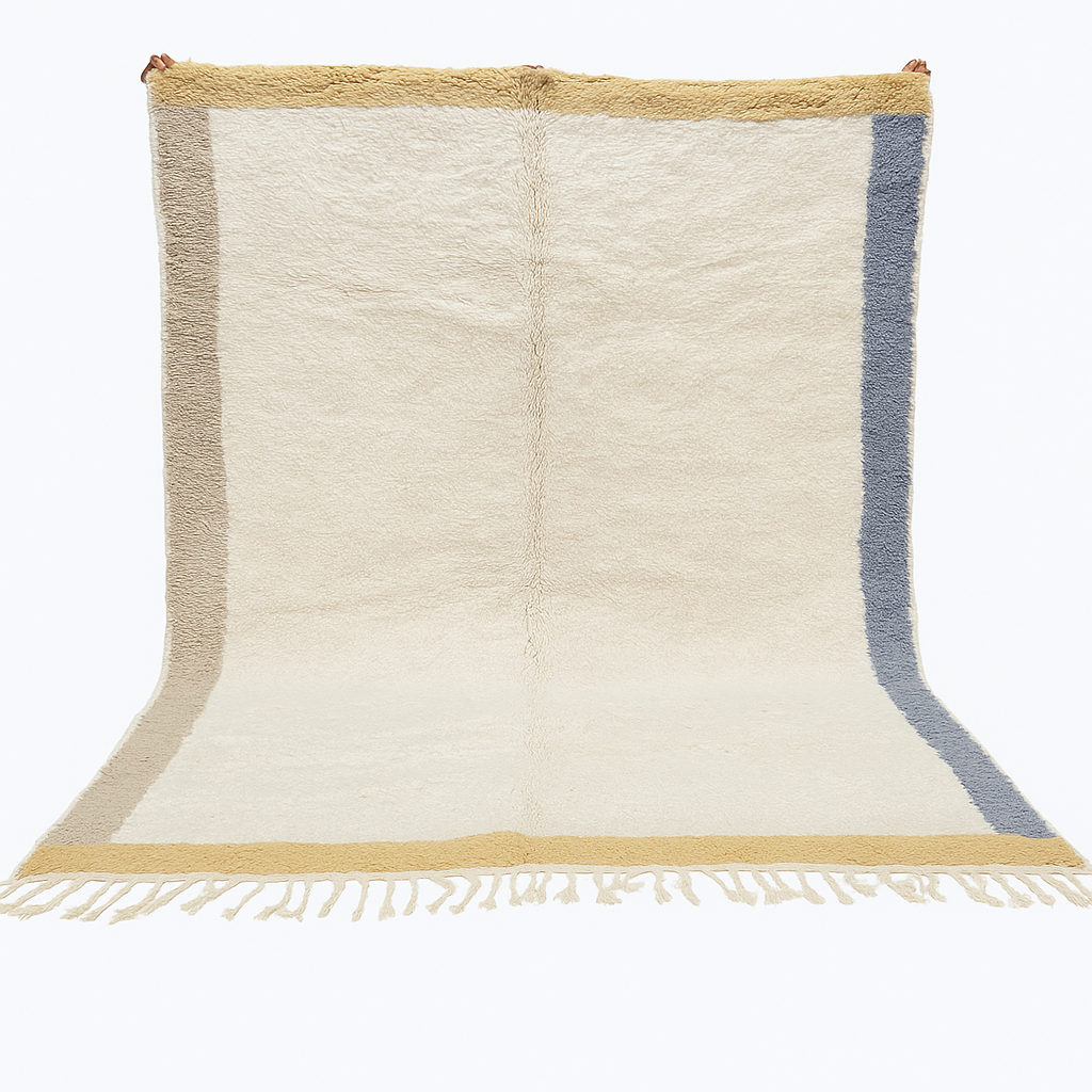 Handwoven neutral Moroccan wool rug with minimalist beige, mustard, and blue borders