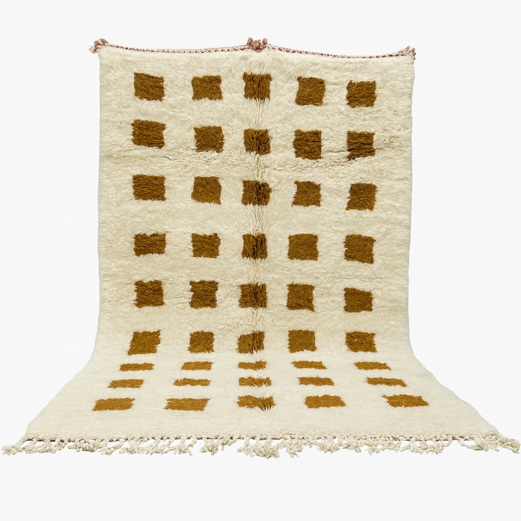 Beige and brown checkered rug with tassels on a white background