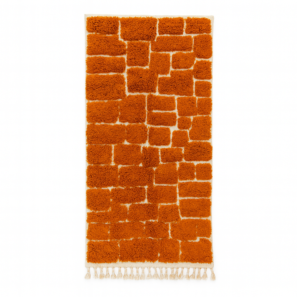 Handmade orange Moroccan runner rug with textured brick pattern in plush wool.
