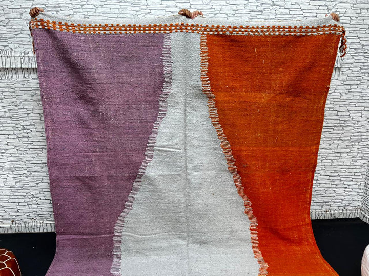 Handwoven Moroccan flatweave wool rug in orange, purple, and light gray – Berber kilim carpet