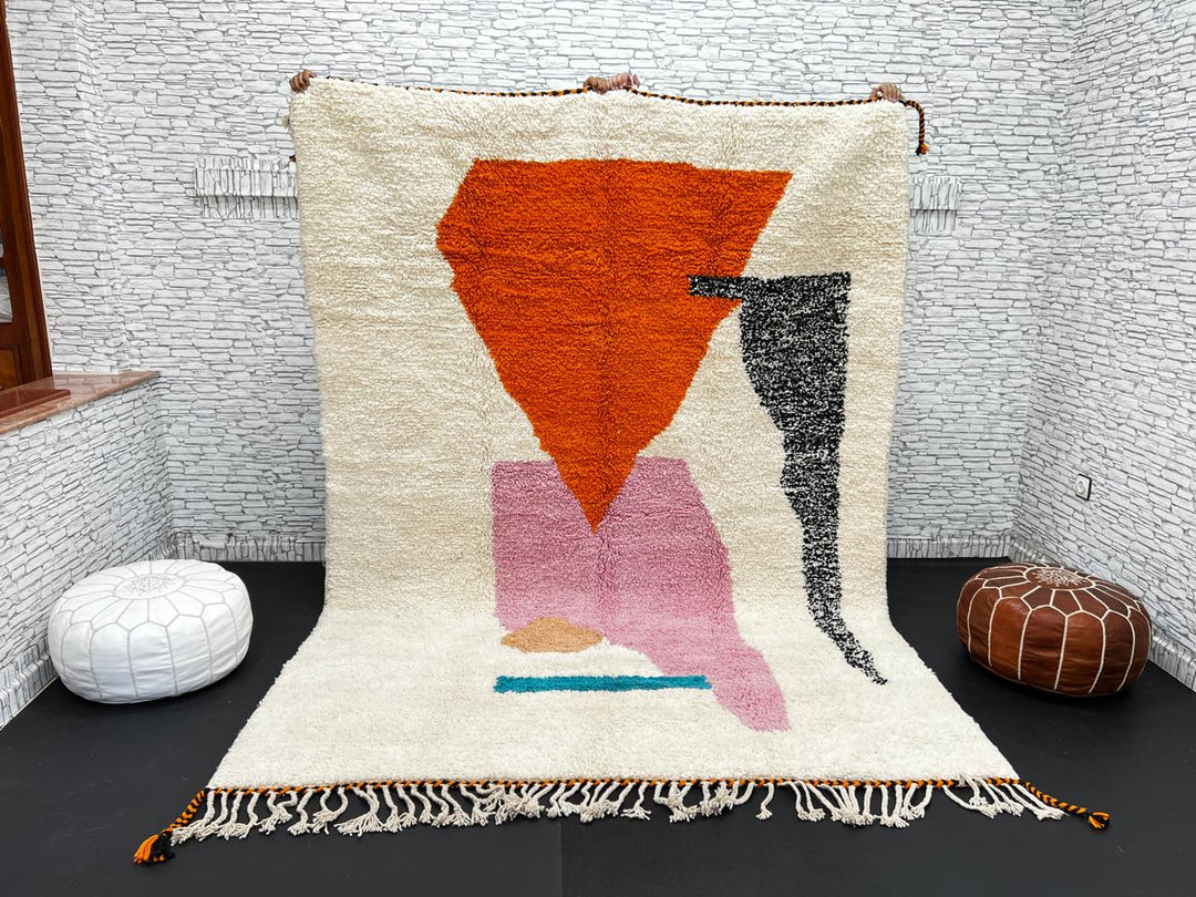 Handwoven Moroccan wool rug in orange, pink, black, and ivory – abstract geometric Berber carpet handmade in Morocco