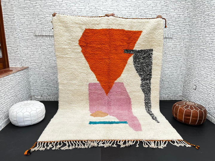 Handwoven Moroccan wool rug in orange, pink, black, and ivory – abstract geometric Berber carpet handmade in Morocco
