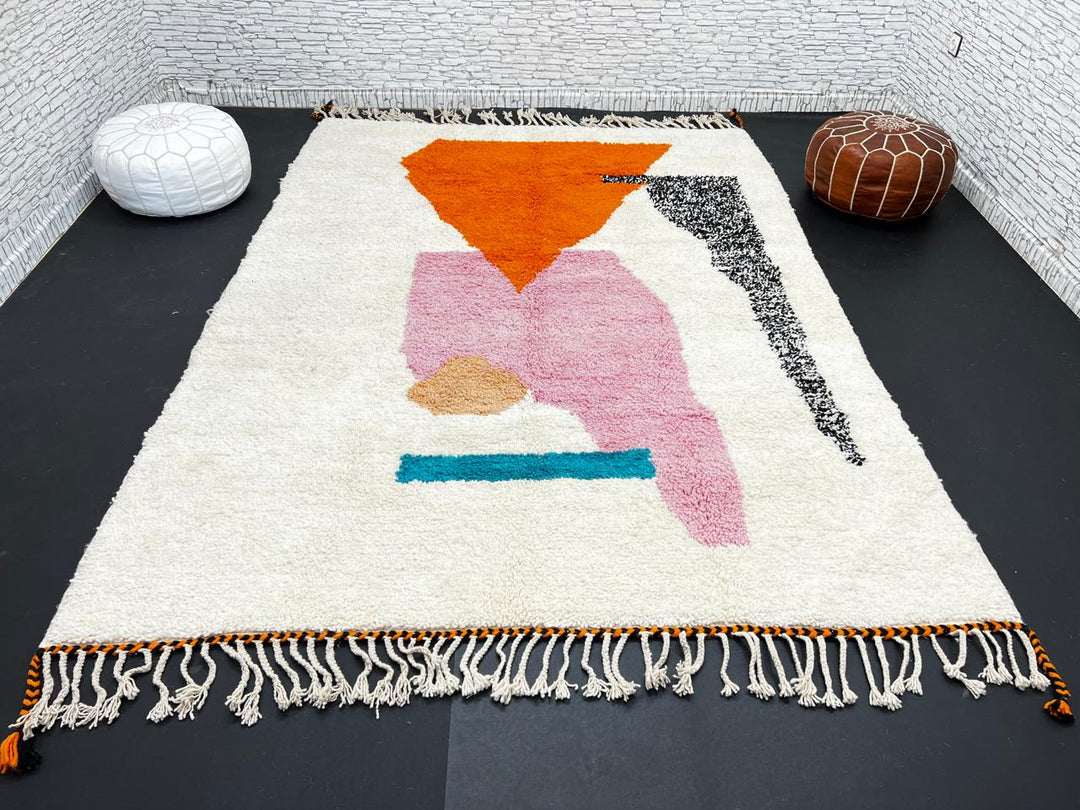 Handwoven Moroccan wool rug in orange, pink, black, and ivory – abstract geometric Berber carpet handmade in Morocco