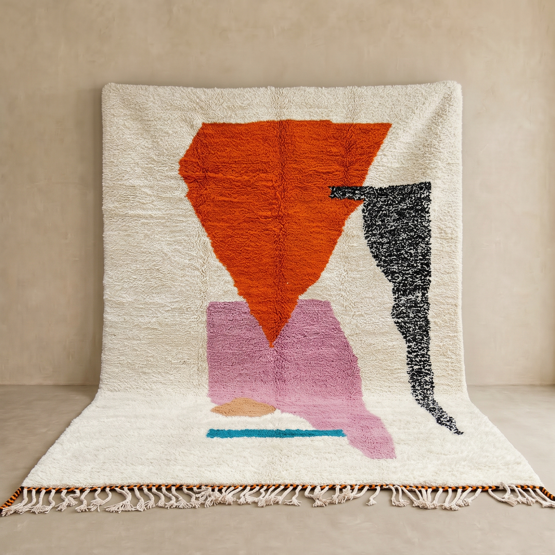 Handwoven Moroccan wool rug in orange, pink, black, and ivory – abstract geometric Berber carpet handmade in Morocco
