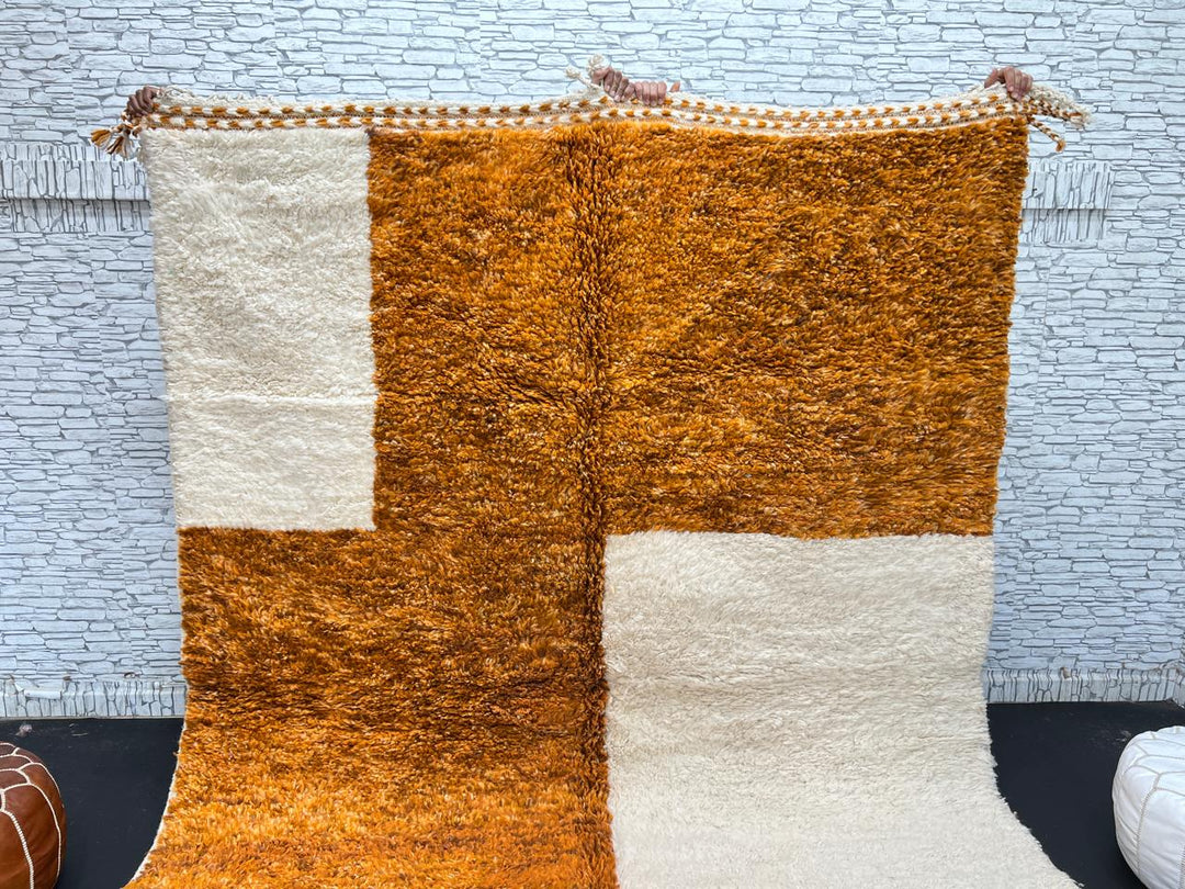 Orange and white handmade Moroccan wool rug with geometric block pattern