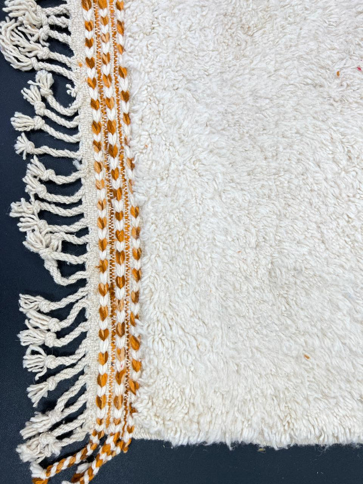 Orange and white handmade Moroccan wool rug with geometric block pattern