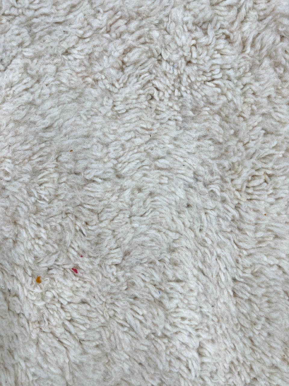 Orange and white handmade Moroccan wool rug with geometric block pattern