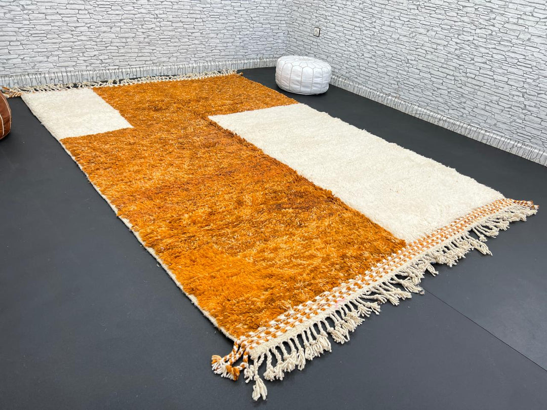 Orange and white handmade Moroccan wool rug with geometric block pattern