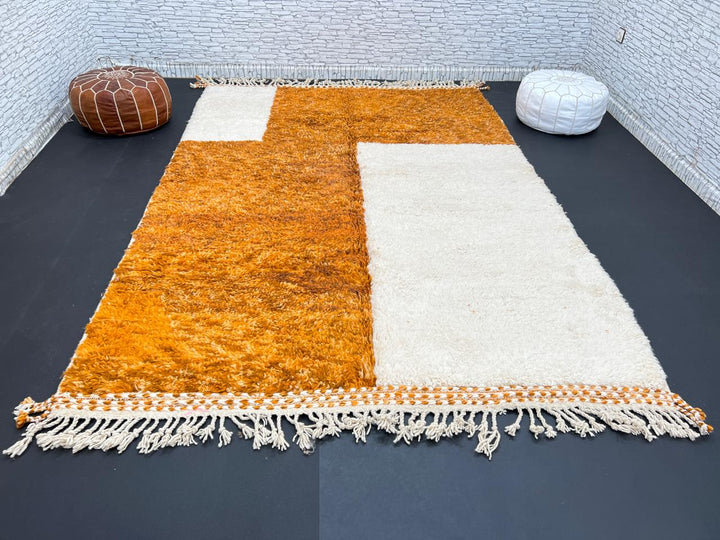 Orange and white handmade Moroccan wool rug with geometric block pattern