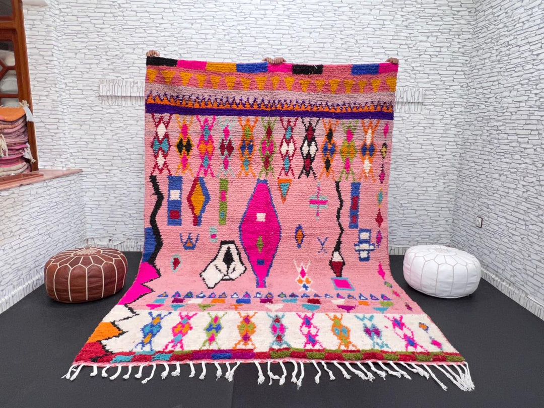 pink handmade moroccan berber rug with geometric tribal patterns in wool