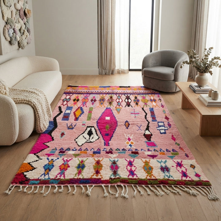 pink handmade moroccan berber rug with geometric tribal patterns in wool
