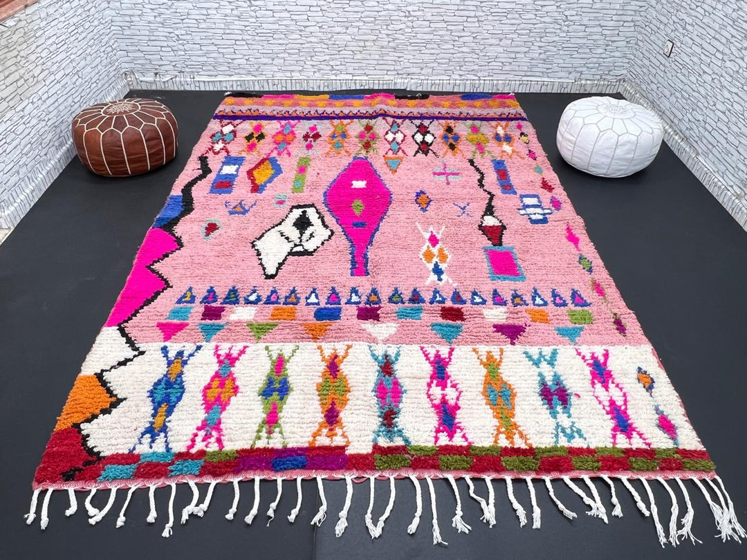 pink handmade moroccan berber rug with geometric tribal patterns in wool