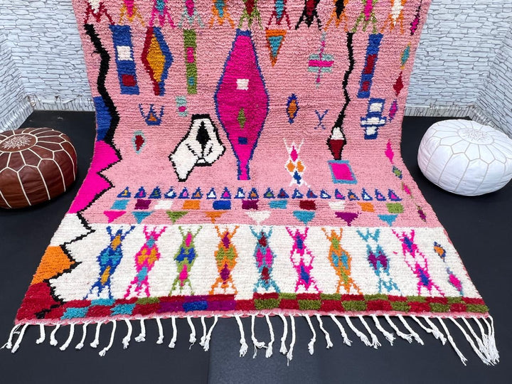 pink handmade moroccan berber rug with geometric tribal patterns in wool