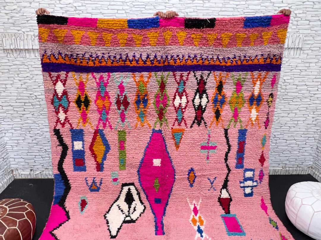 pink handmade moroccan berber rug with geometric tribal patterns in wool