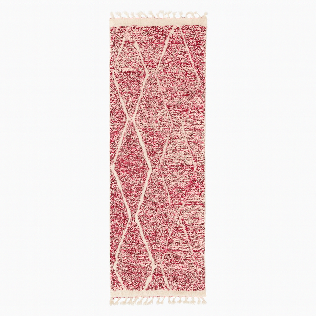 Handwoven pink Moroccan wool runner rug with white diamond lattice pattern.