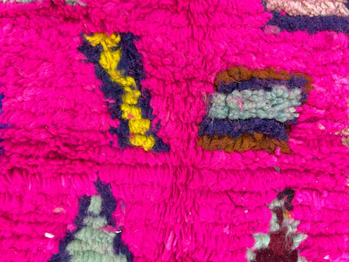 Pink Moroccan runner rug with colorful Berber diamond patterns handmade in wool