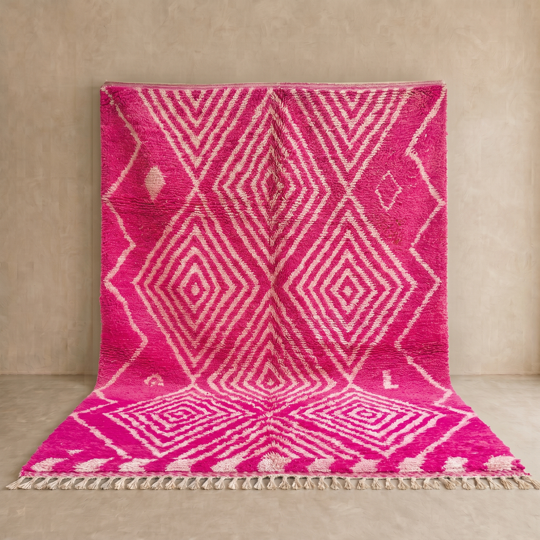 Hot pink Moroccan wool rug with ivory diamond geometric design handmade by Berber artisans
