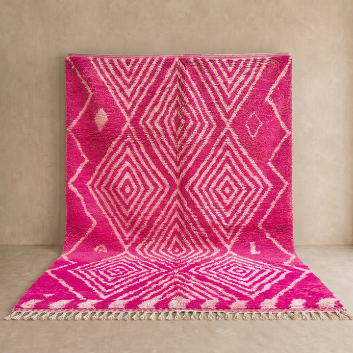 Hot pink Moroccan wool rug with ivory diamond geometric design handmade by Berber artisans
