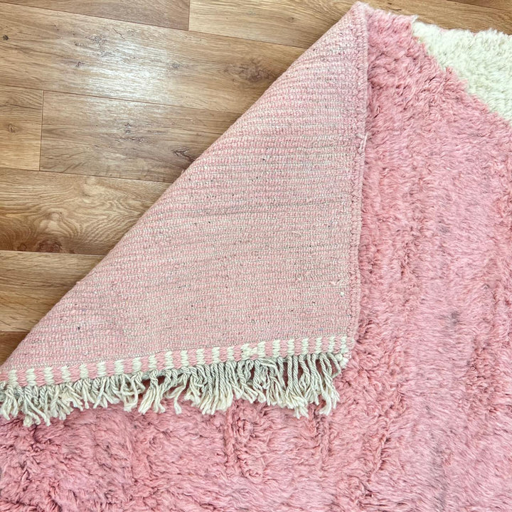 Pink and cream Moroccan wool rug with modern geometric design