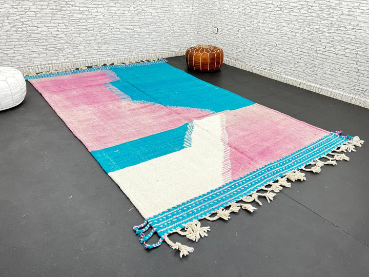 Handwoven Moroccan flatweave wool rug in pink, turquoise blue, and ivory – geometric Berber carpet handmade in Morocco