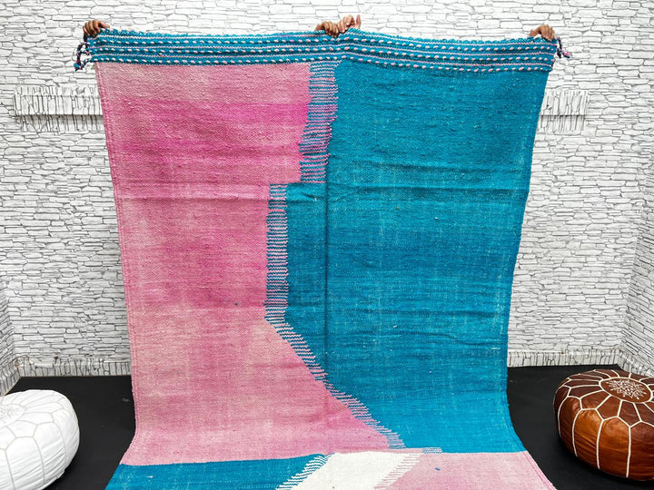 Handwoven Moroccan flatweave wool rug in pink, turquoise blue, and ivory – geometric Berber carpet handmade in Morocco
