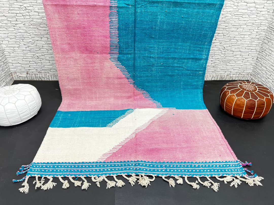 Handwoven Moroccan flatweave wool rug in pink, turquoise blue, and ivory – geometric Berber carpet handmade in Morocco