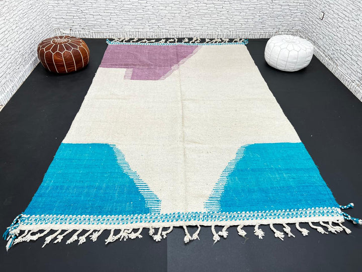 Handwoven Moroccan wool rug in purple, turquoise blue, and cream white – modern flatweave Berber carpet