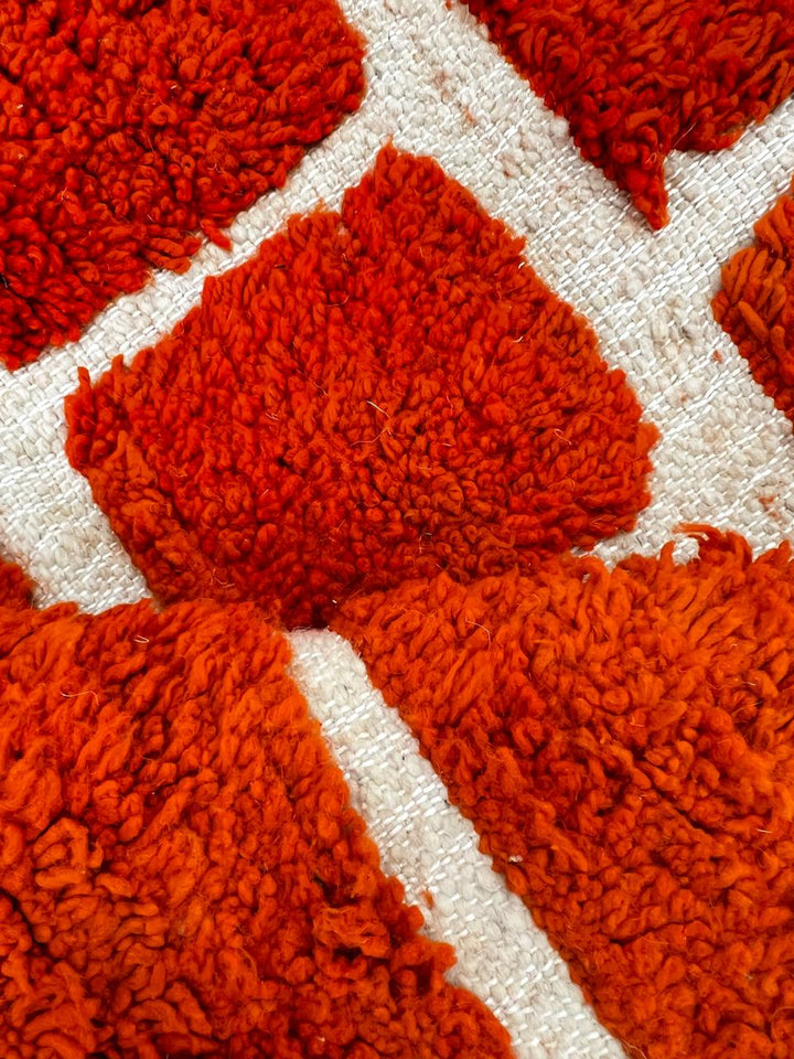 Red Moroccan runner rug with brick geometric pattern, handmade wool Berber carpet