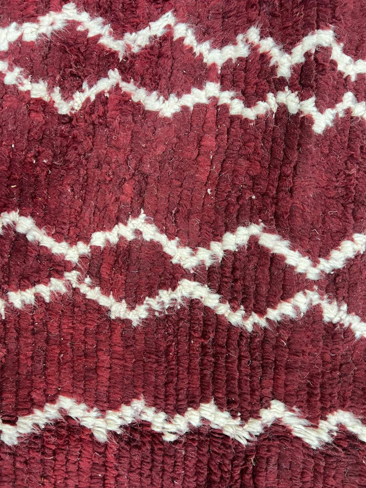 Burgundy Moroccan runner rug handwoven in wine red wool with flowing white ivory lines