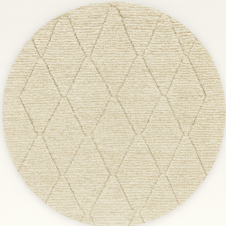 Round Moroccan wool rug with subtle carved diamond pattern, handmade by Berber artisans